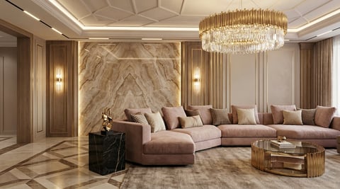 Luxury living room with pink sectional sofa, marble accent wall, crystal chandelier, and modern furnishings in neutral tones